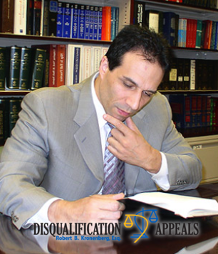 Robert B. Kronenberg, retired NYPD captain and current attorney, reviewing a law book.